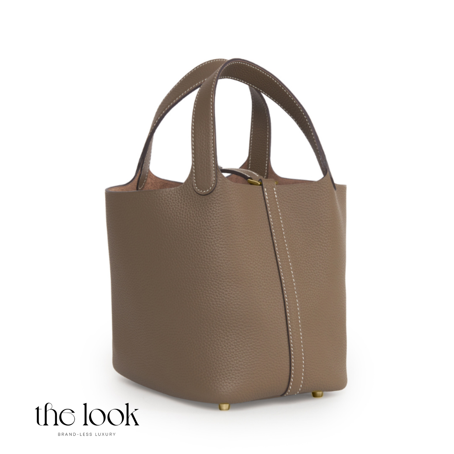 Brown leather handbag on a white background with 'the look' branding. | The Look Officiel