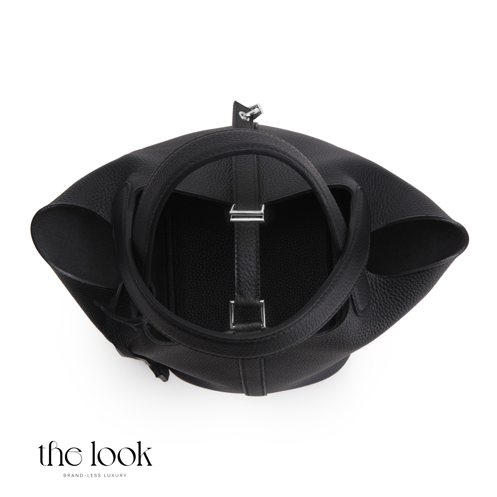 Black leather bag with a circular design on a white background, featuring 'the look' brand. | The Look Officiel