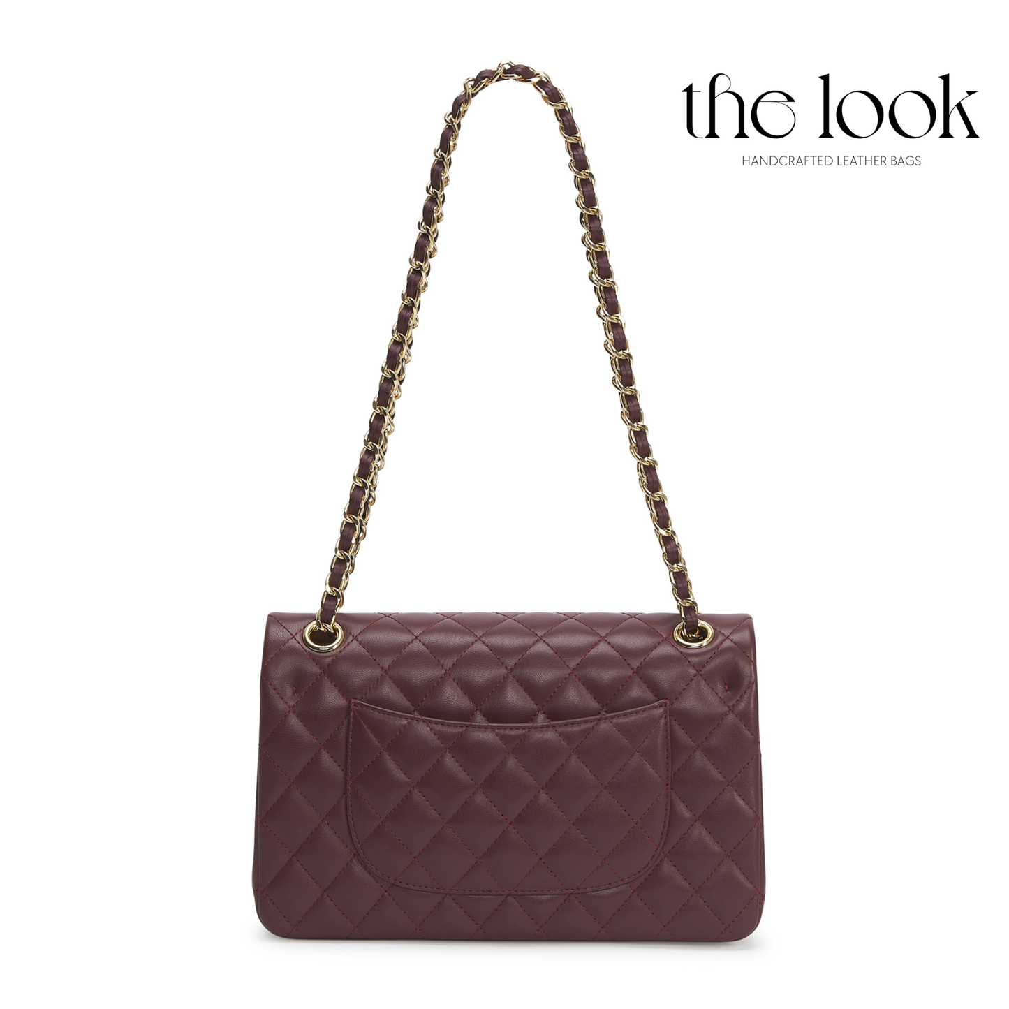 Quilted handbag with chain strap on a white background, branded 'the look'. | The Look Officiel
