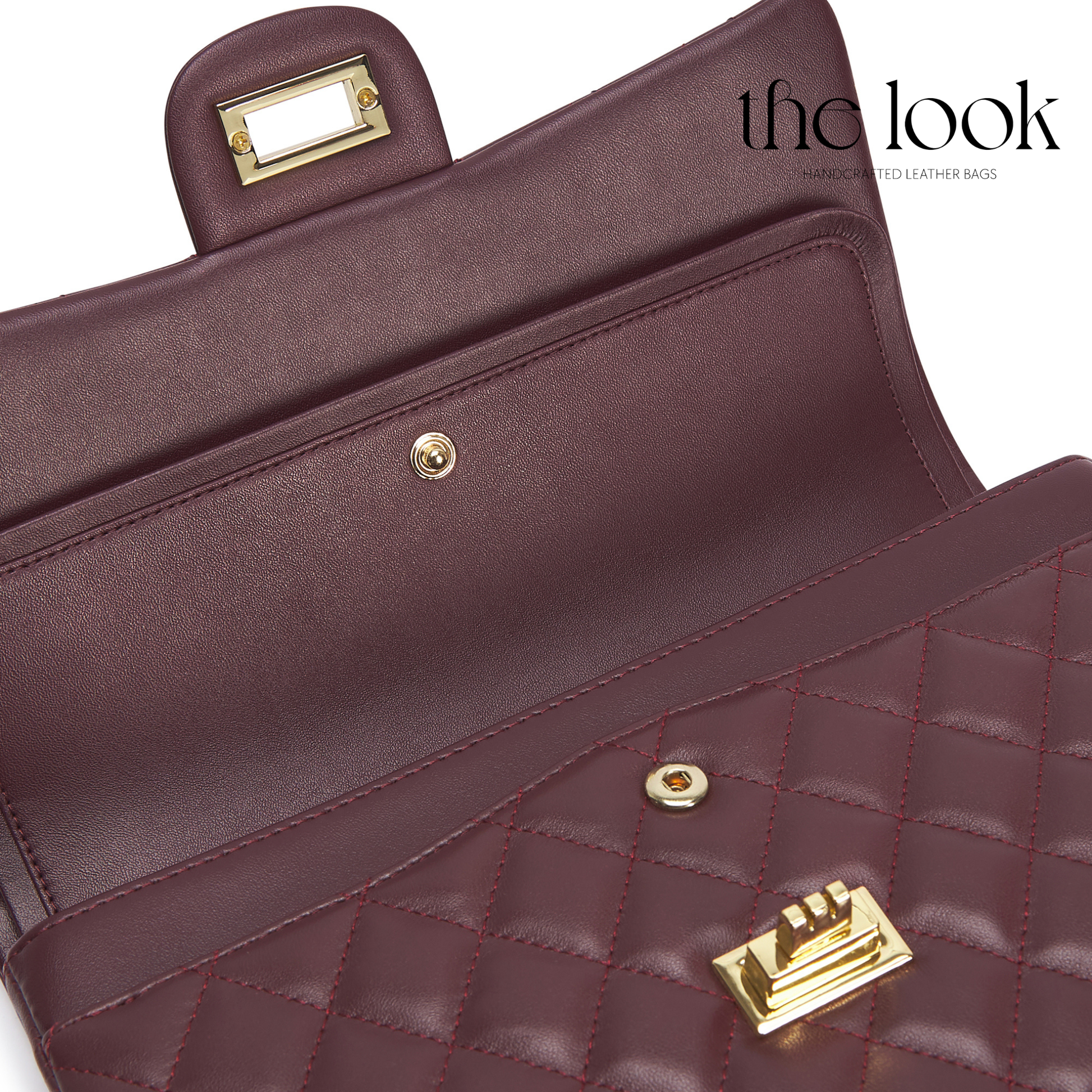 Maroon leather handbag with gold hardware on a white background, featuring 'the look' branding. | The Look Officiel