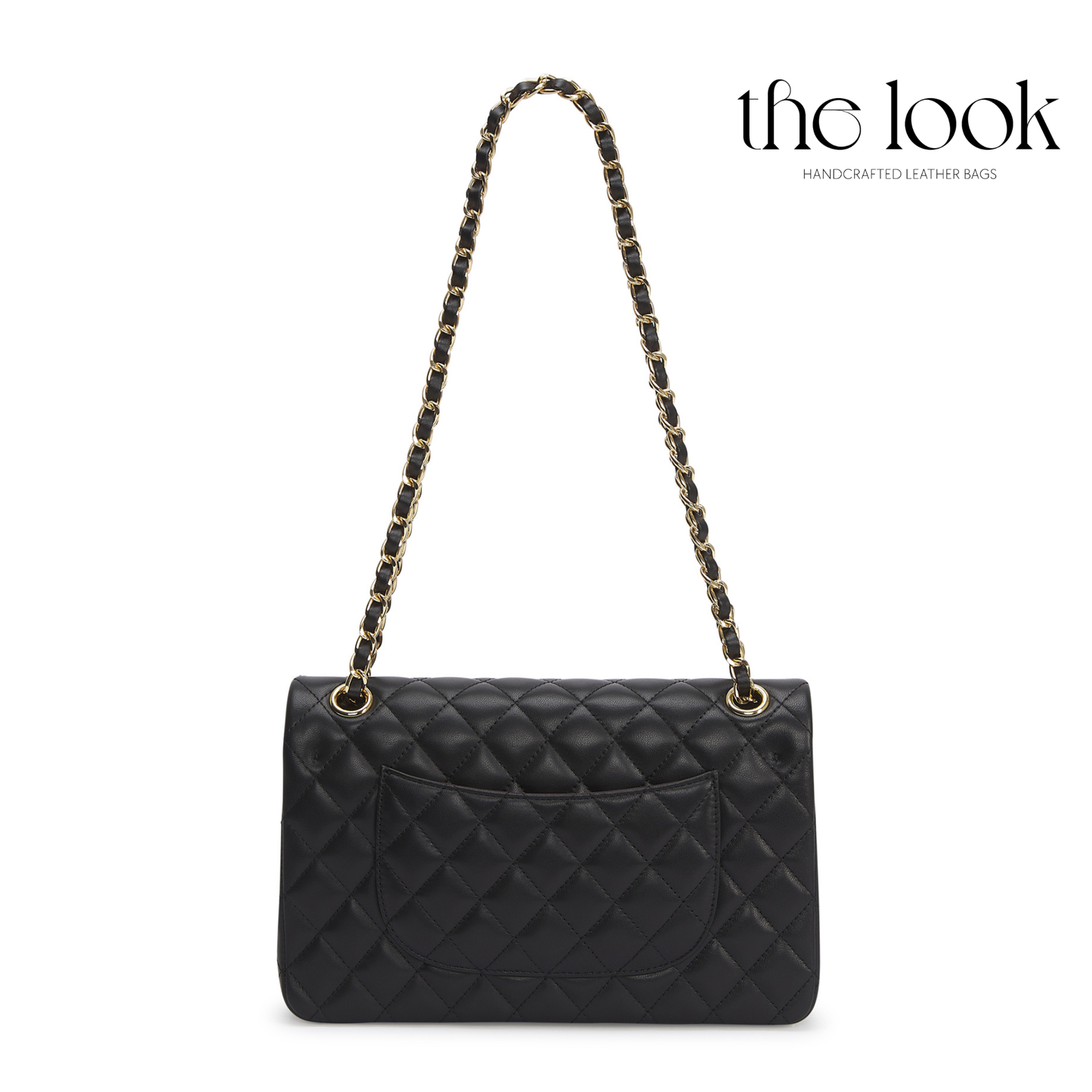 Black quilted handbag with a chain strap on a white background, featuring 'the look' brand. | The Look Officiel