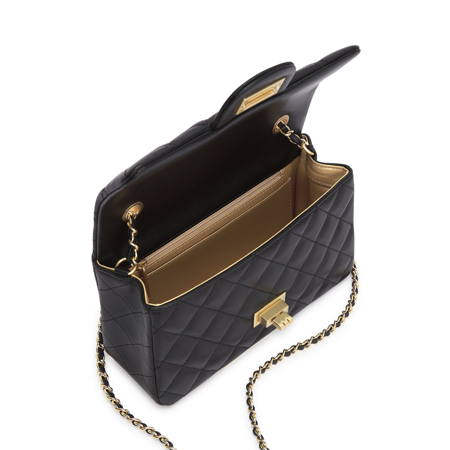 Black quilted handbag with gold chain strap on a white background. | The Look Officiel