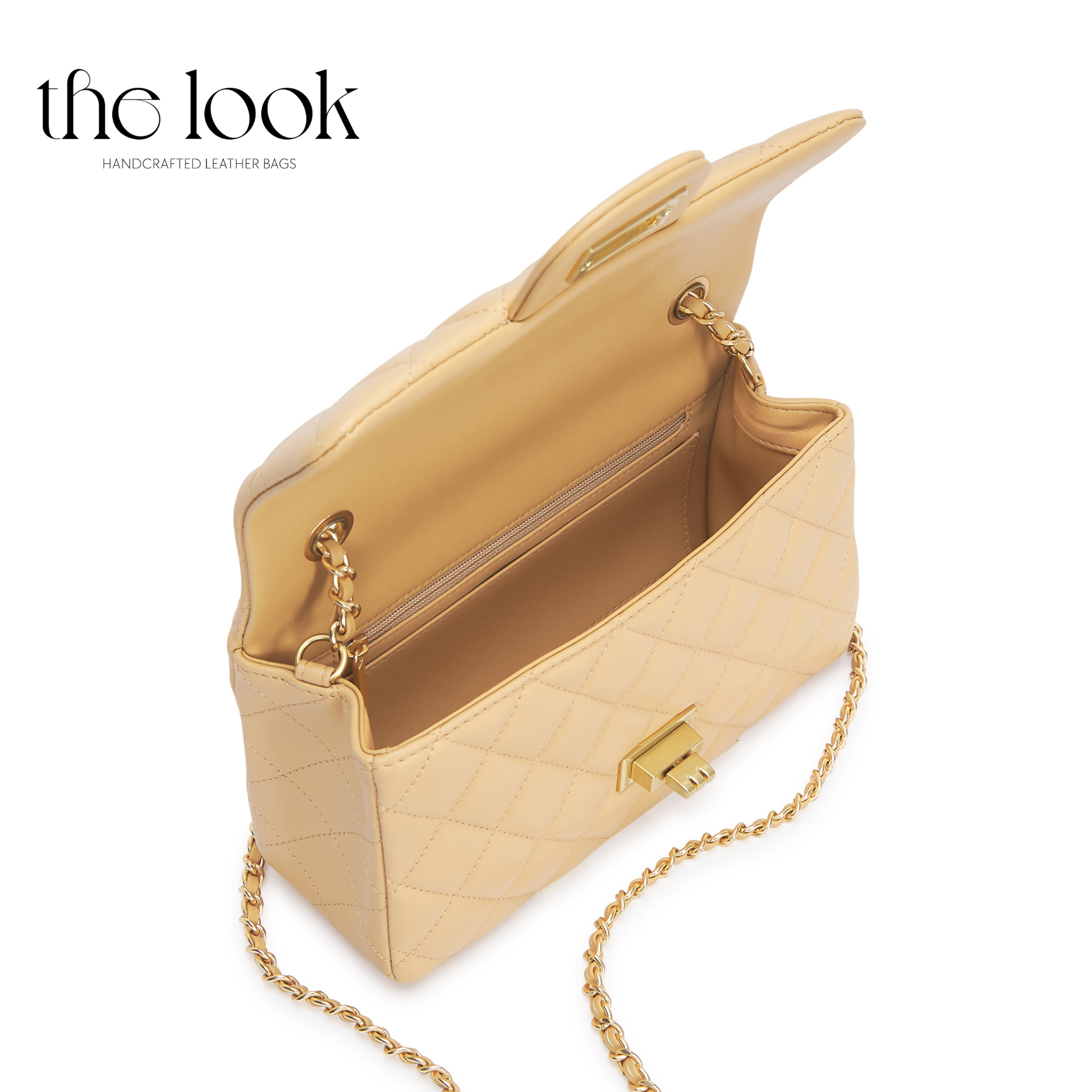 Gold handbag with chain detail on a white background, featuring 'the look' brand. | The Look Officiel