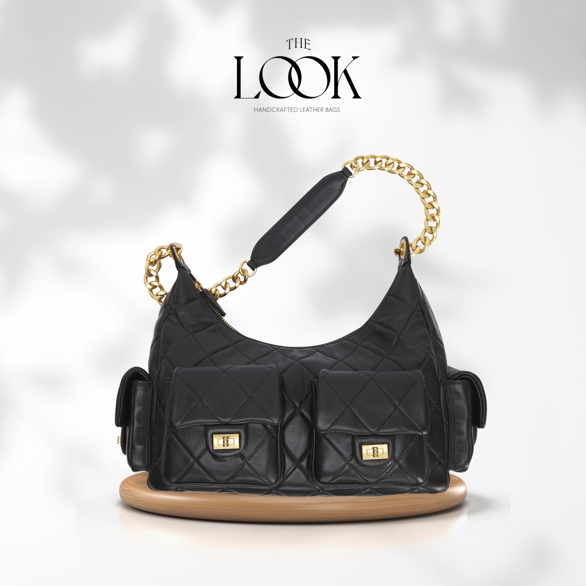 The Quilte Small Multipocket Shoulder Bag — quilted genuine leather, back view | The Look Officiel