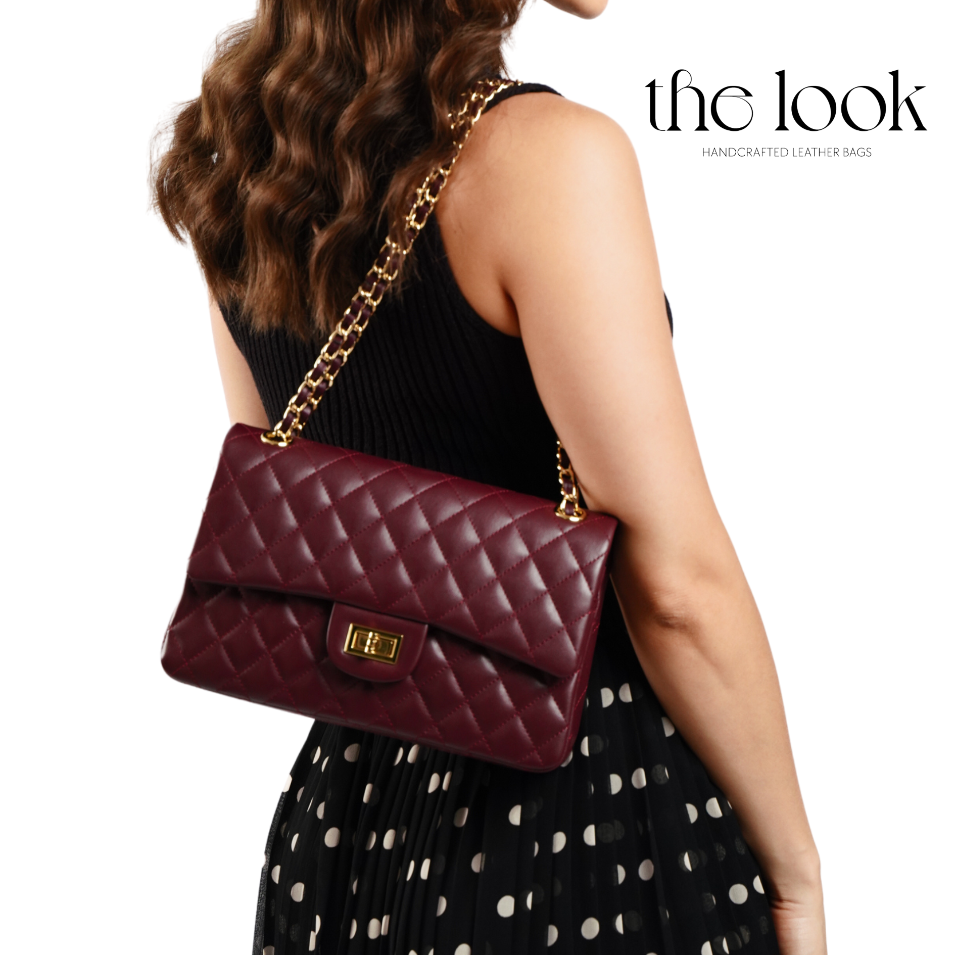 Maroon quilted handbag with gold chain strap worn by a person in a polka dot dress, branded 'the look'. | The Look Officiel