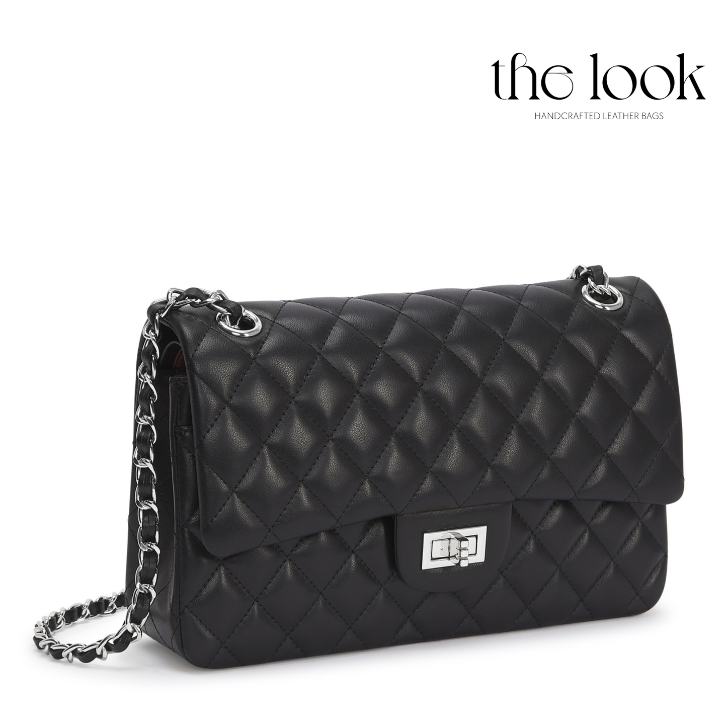 Black quilted handbag with chain strap on a white background, branded 'the look'. | The Look Officiel