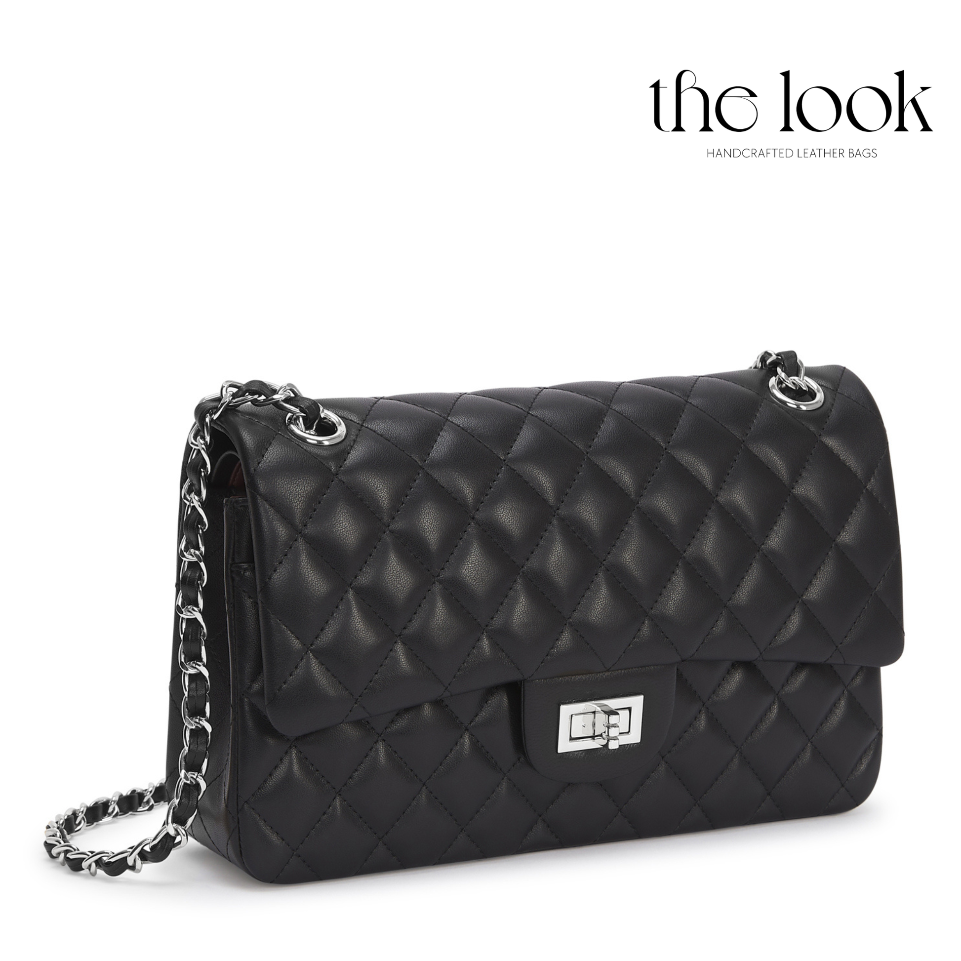 Black quilted handbag with chain strap on a white background, branded 'the look'. | The Look Officiel