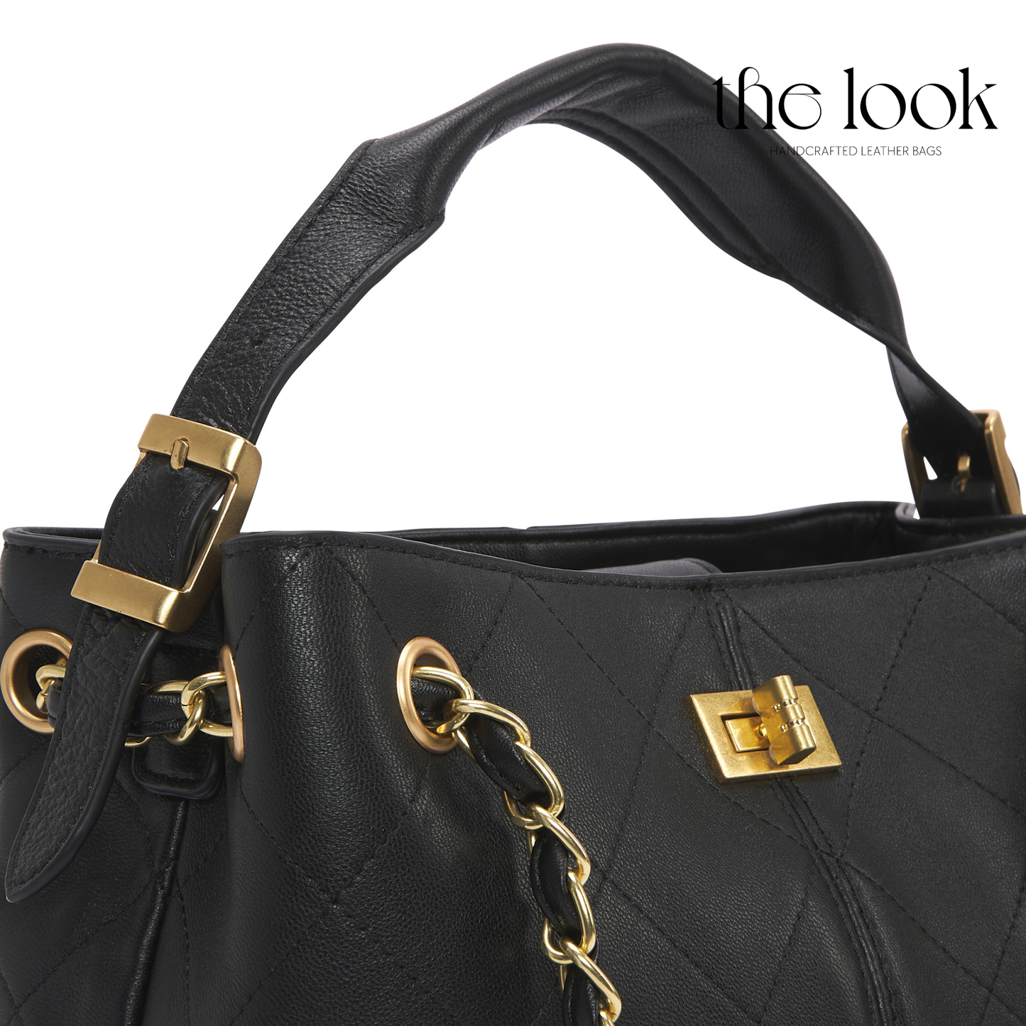 Black leather handbag with gold accents on a white background, featuring 'the look' brand. | The Look Officiel