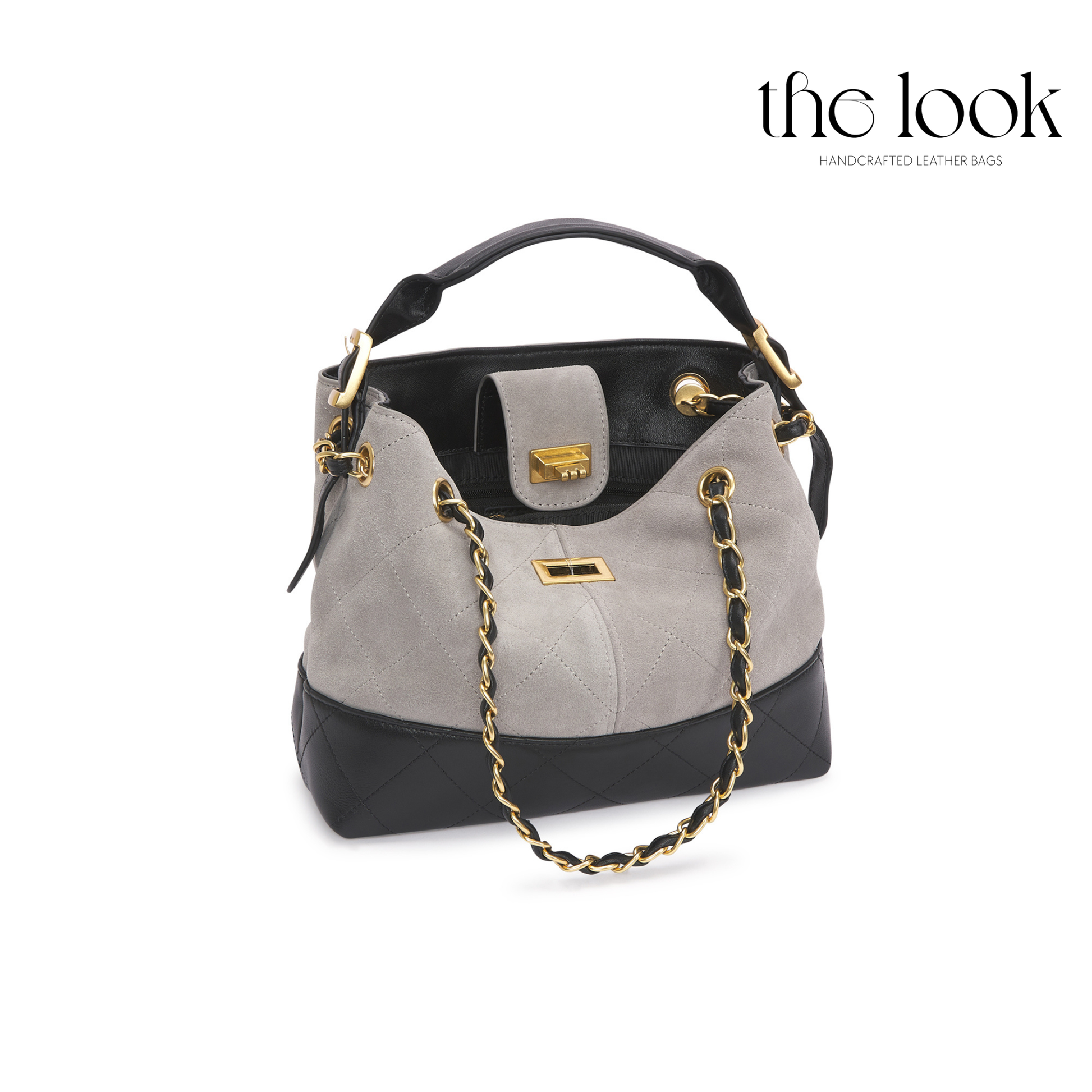 Gray and black handbag with gold chain detail on a white background, featuring 'the look' brand. | The Look Officiel