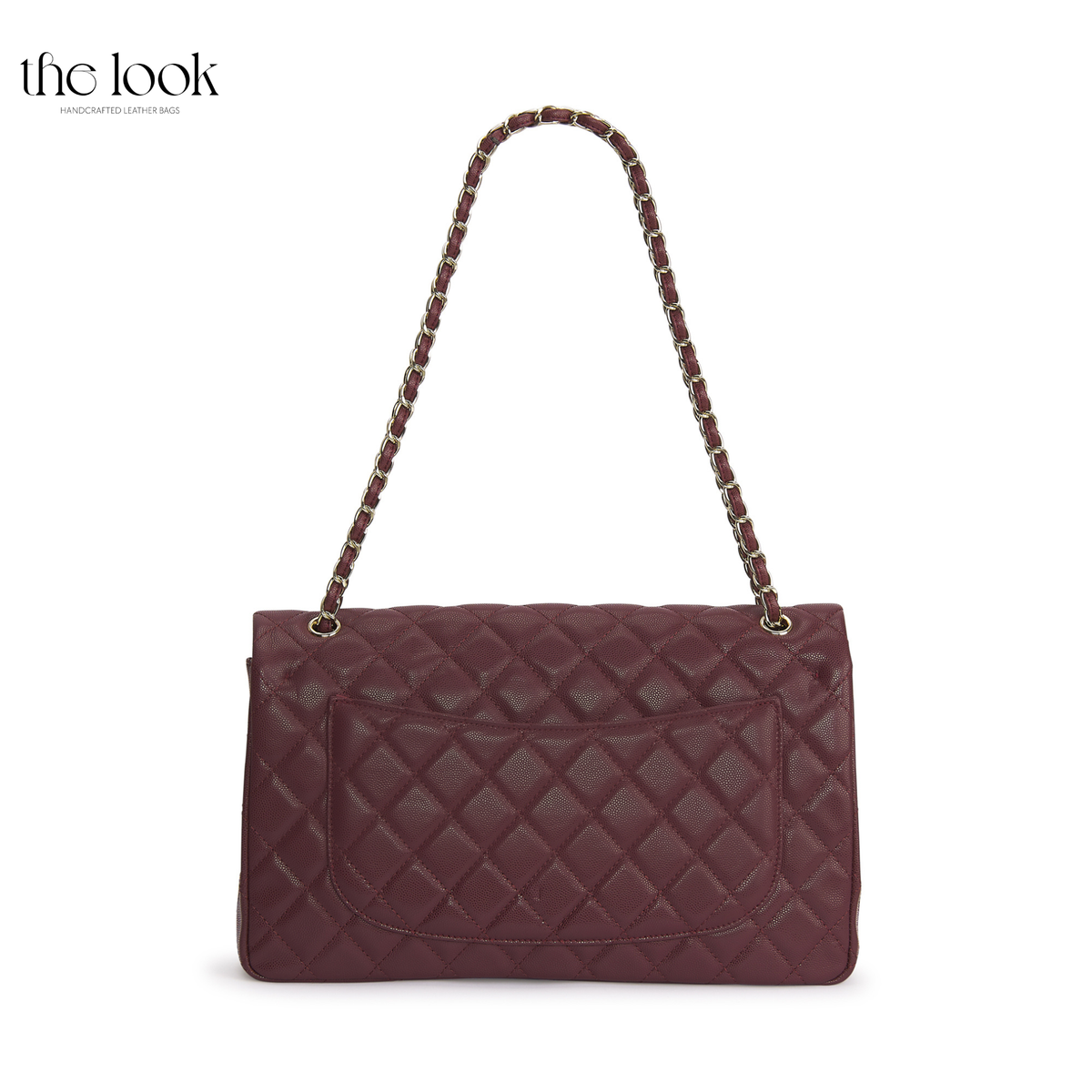 The Quilte Extra Large Convertible Shoulder Bag in Burgundy with chain strap extended, back view | The Look Officiel