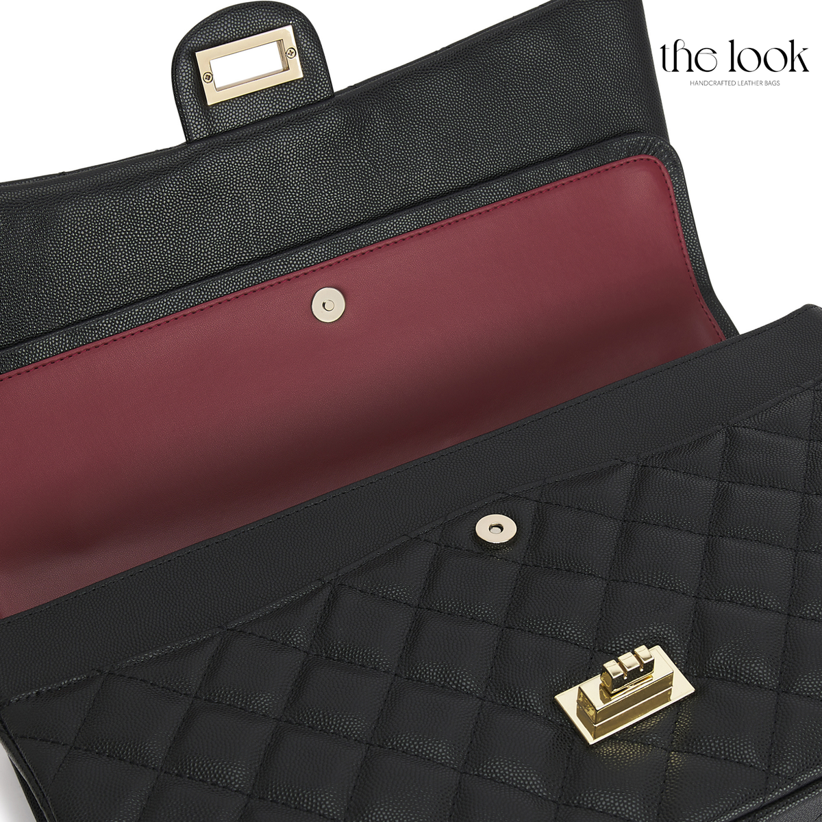 The Quilte Extra Large Convertible Shoulder Bag in Black with open double-flap interior | The Look Officiel