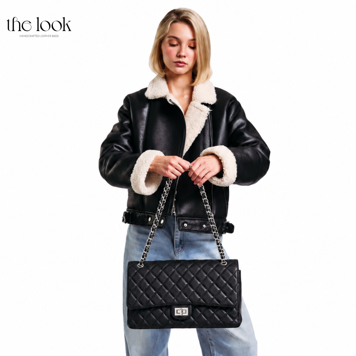 Model carrying The Quilte Extra Large Convertible Shoulder Bag in Black with chain strap | The Look Officiel
