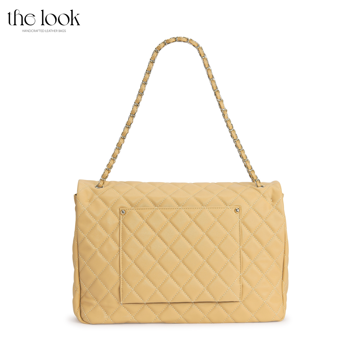 Biscuit The Quilte Jumbo Convertible Travel Bag rear view with exterior slip pocket | The Look Officiel