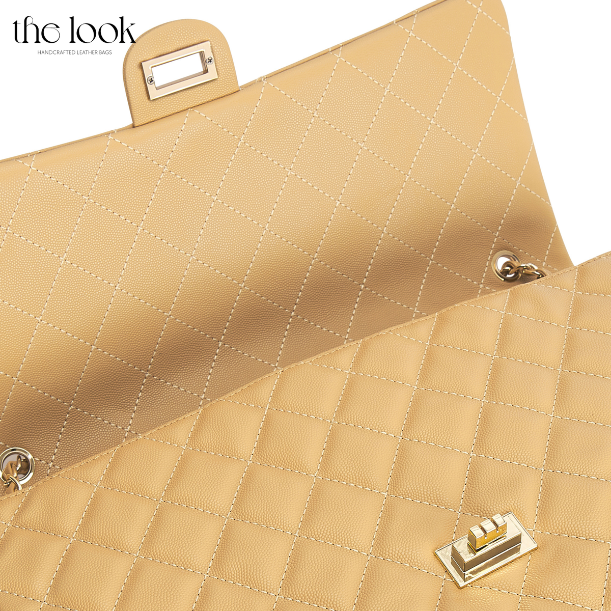Biscuit The Quilte Jumbo Convertible Travel Bag close-up of quilting and silver twist-lock hardware | The Look Officiel