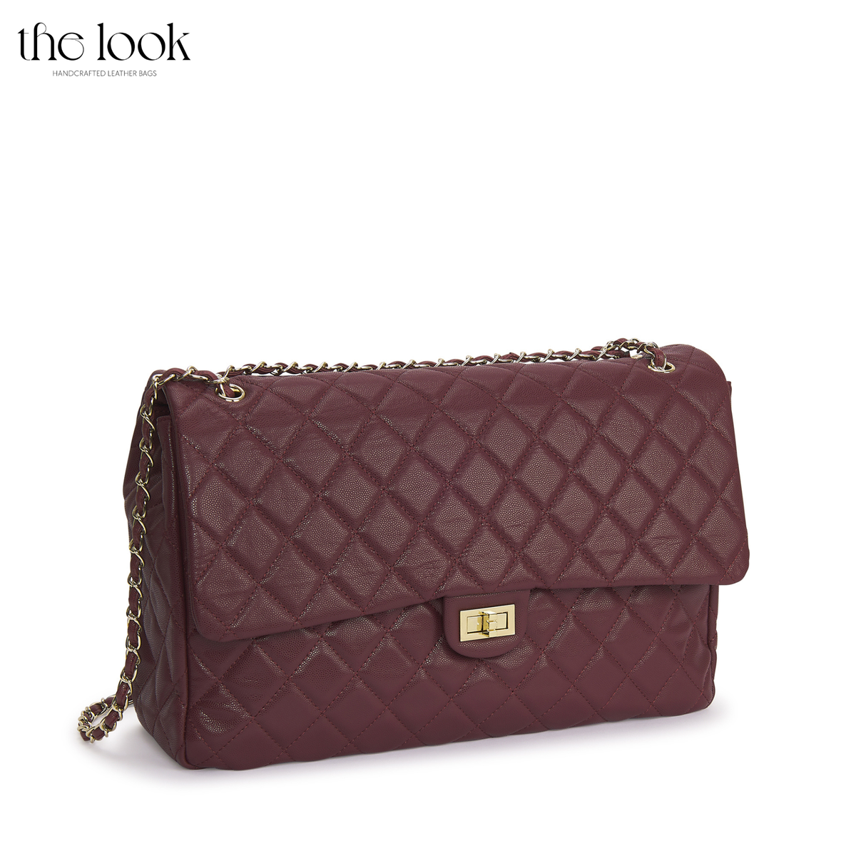 Burgundy The Quilte Jumbo Convertible Travel Bag, angled front view | The Look Officiel