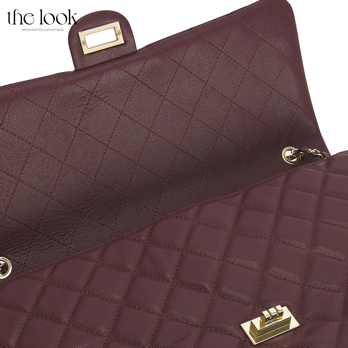 Burgundy The Quilte Jumbo Convertible Travel Bag close-up of quilting and twist-lock hardware | The Look Officiel