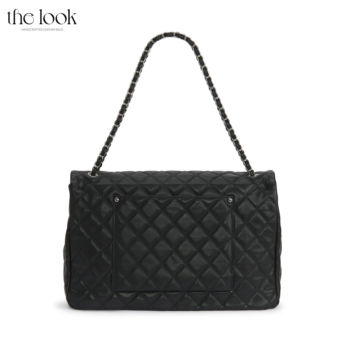 Black The Quilte Jumbo Convertible Travel Bag rear view with exterior slip pocket | The Look Officiel