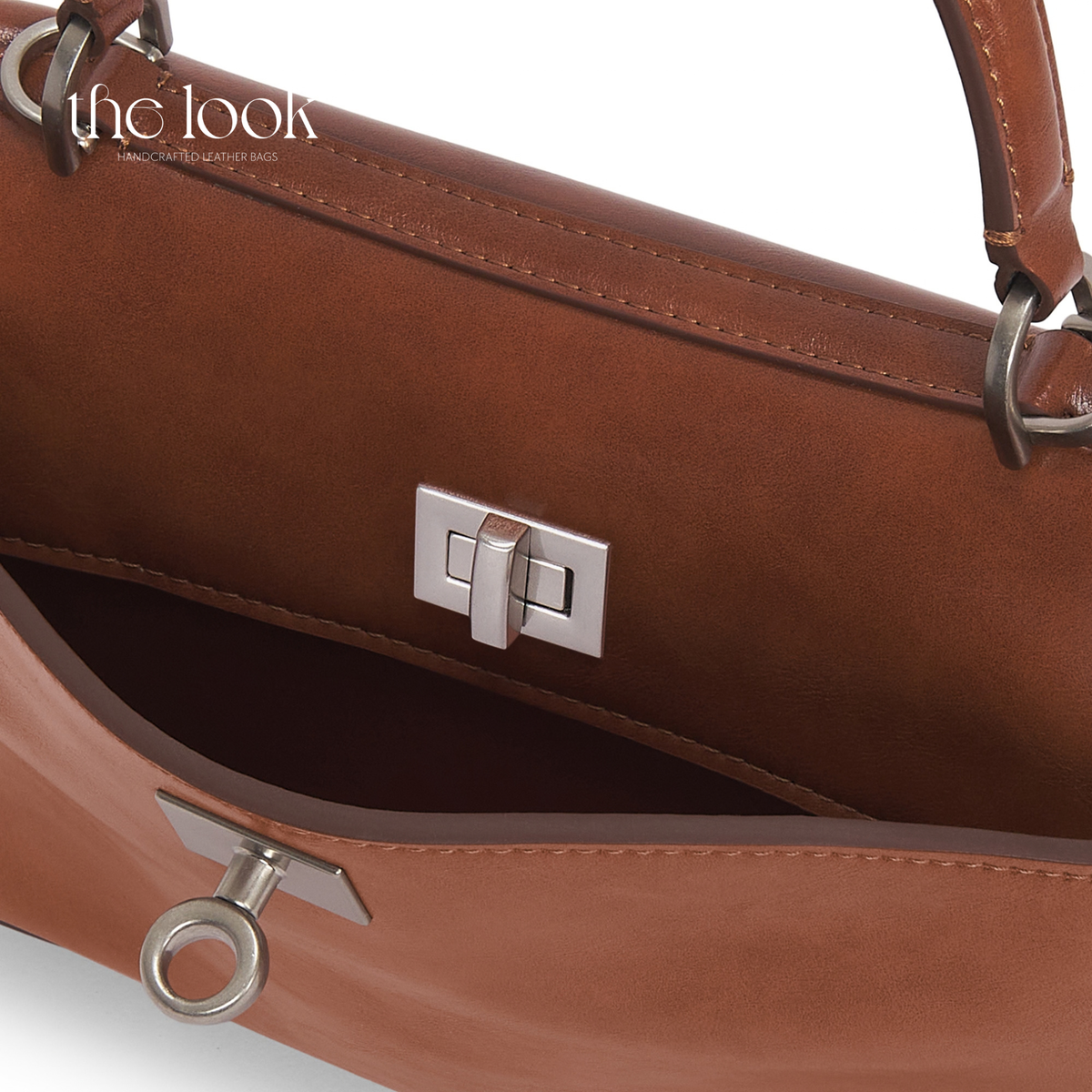 Valen Small Satchel in Caramel, close-up of front closure and silver-tone hardware | The Look Officiel