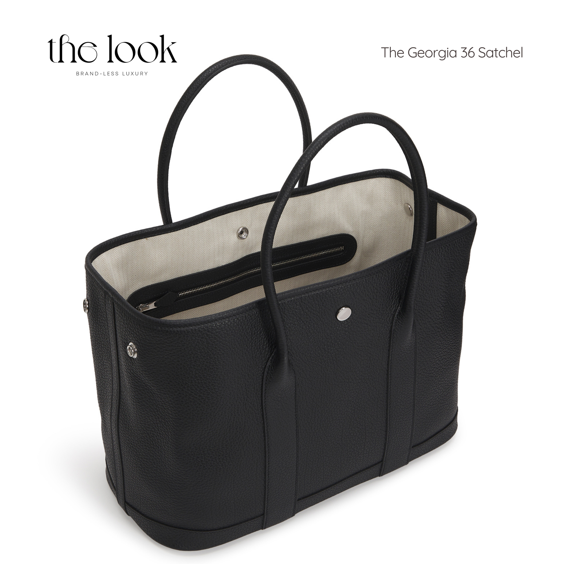 Black satchel bag with 'the look' branding on a white background | The Look Officiel