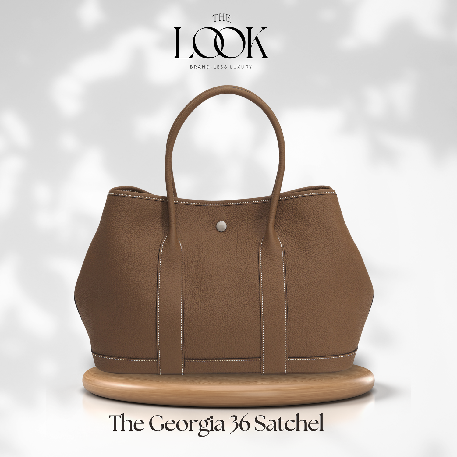 Brown satchel bag on a white background with 'The Look' branding. | The Look Officiel