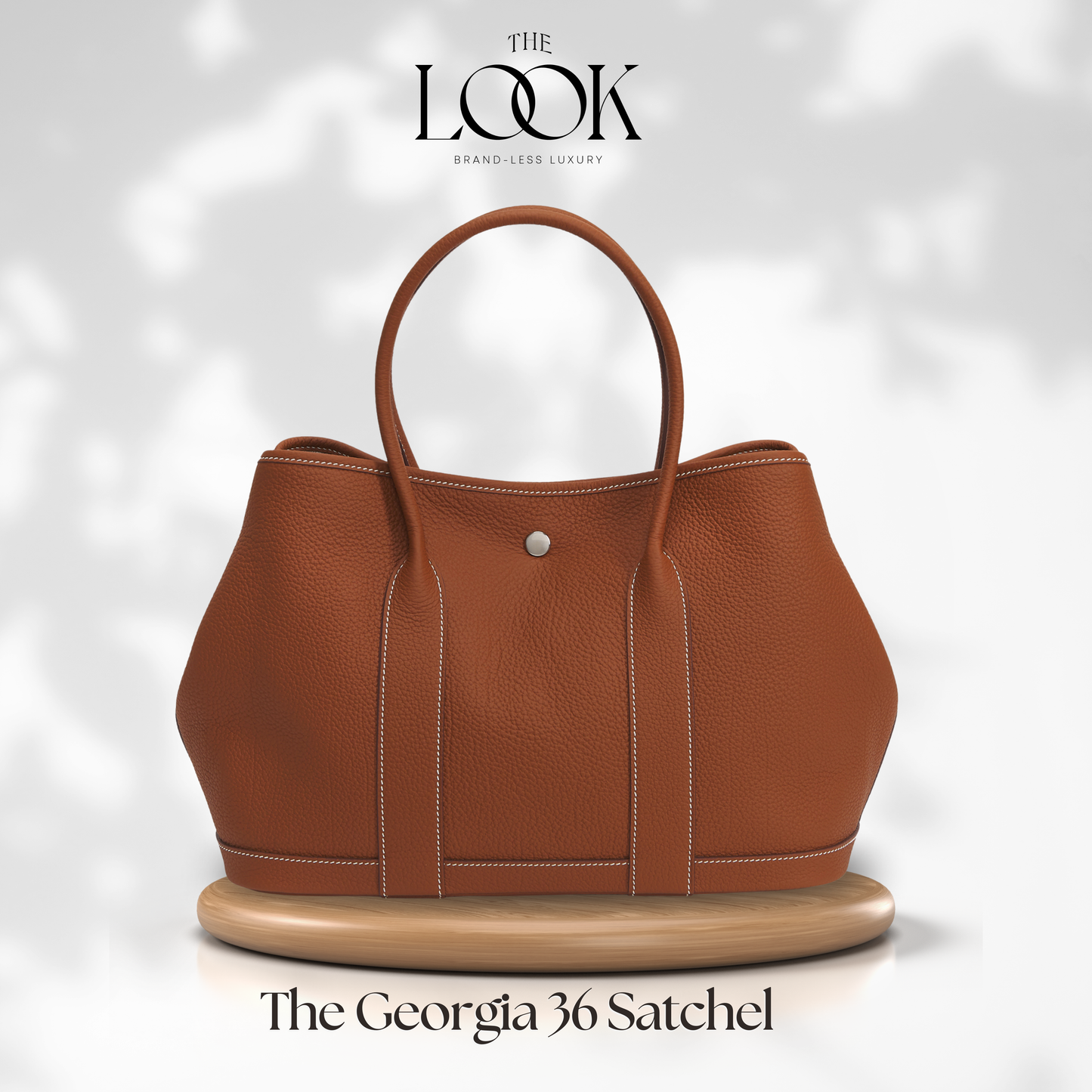 Brown satchel bag on a white background with 'The Look' branding. | The Look Officiel