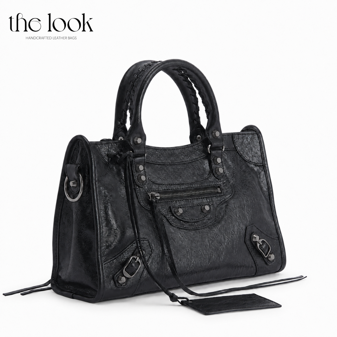 Biker Satchel Medium black goatskin gunmetal hardware angled view