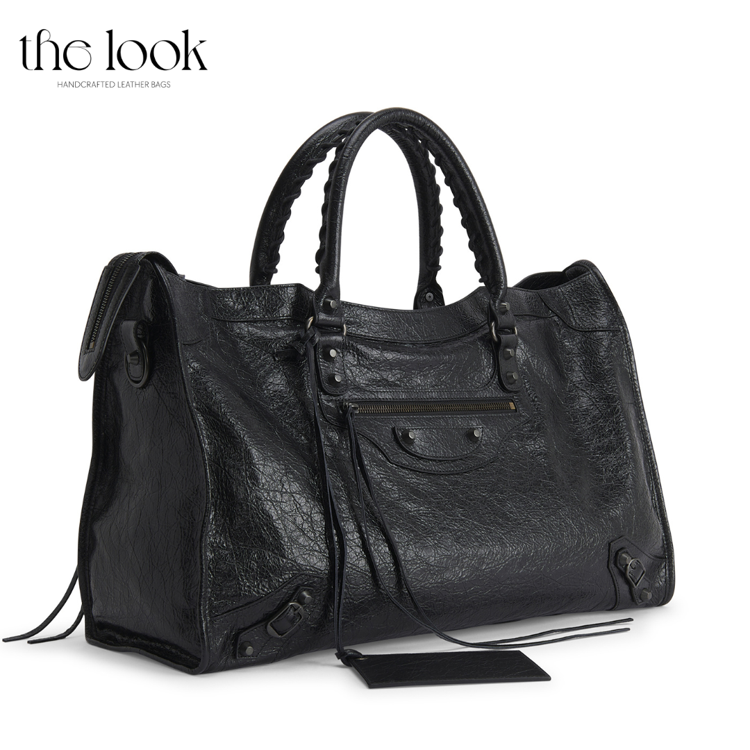 Biker Satchel Jumbo black goatskin braided handles gunmetal hardware angled view