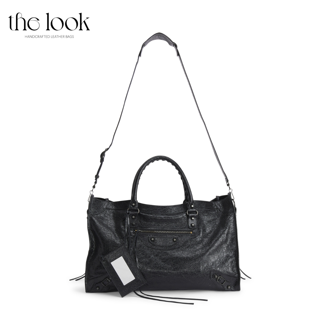 Biker Satchel Jumbo black goatskin braided handles gunmetal hardware front view shoulder strap