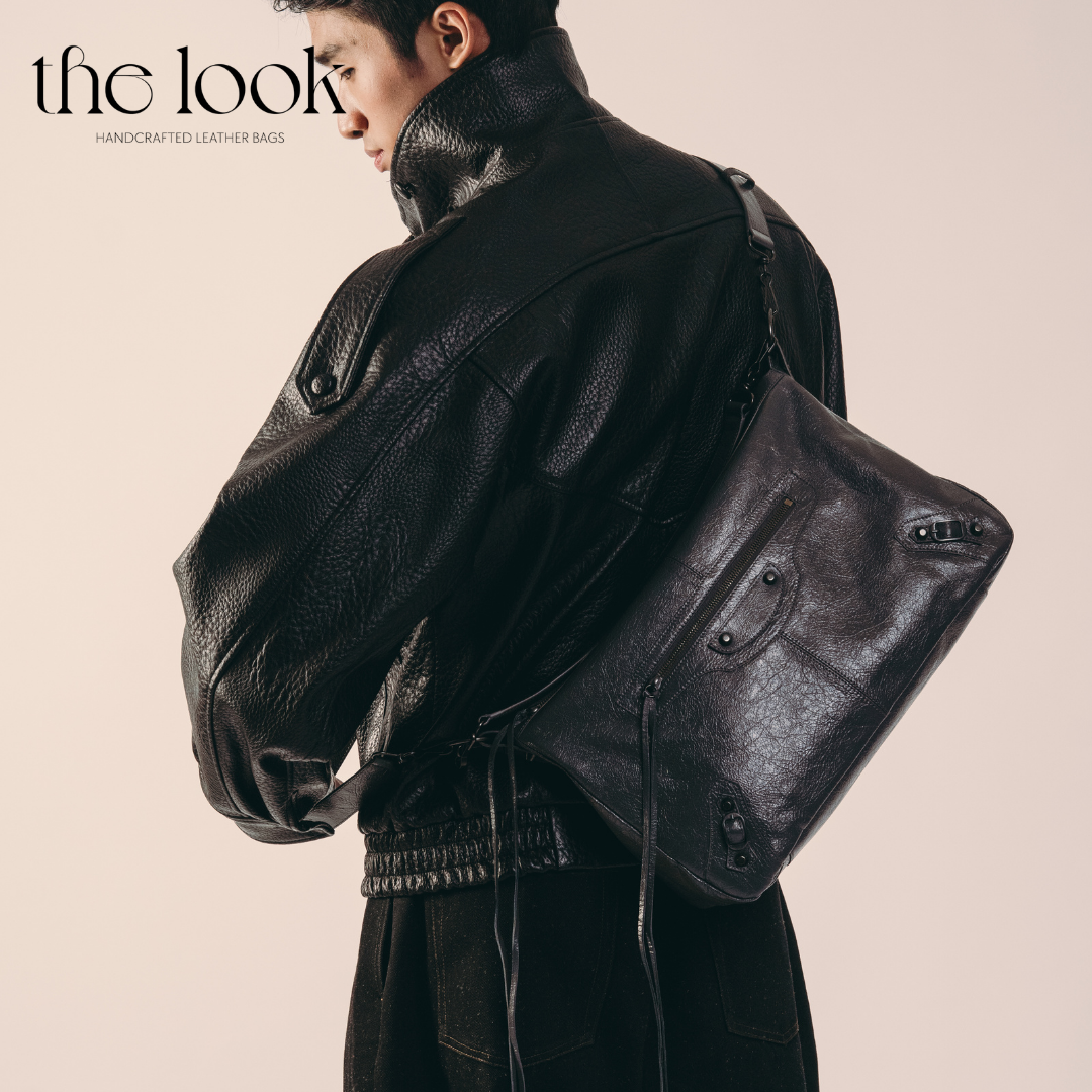 model wearing Biker Convertible shoulder bag black goatskin handle front view