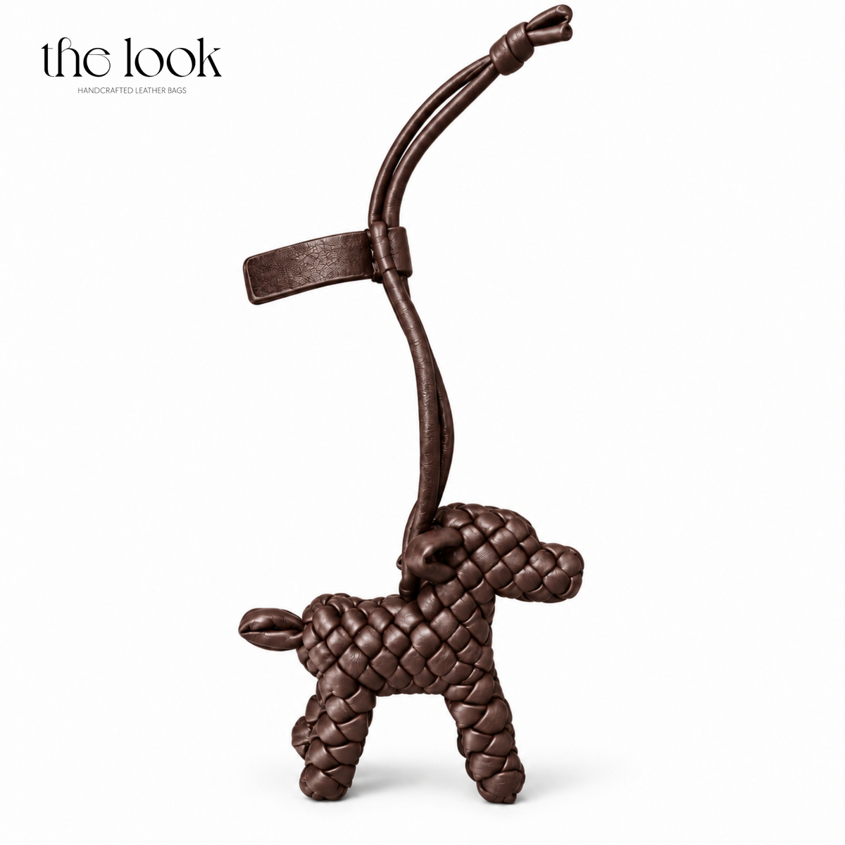 The Loop Pupper Bag Charm in Ebene Brown on a white background