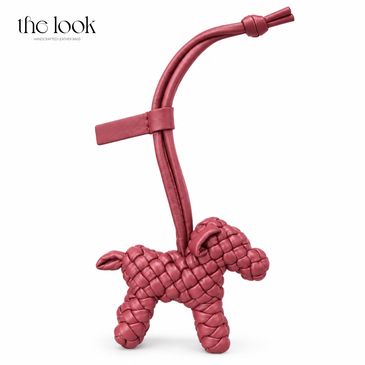 The Loop Pupper Bag Charm in Burgundy on a white background