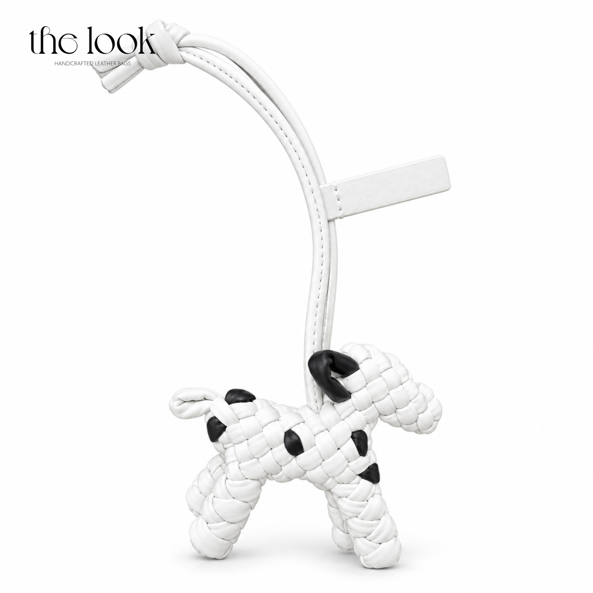 The Loop Pupper Bag Charm in Dalmatian on a white background
