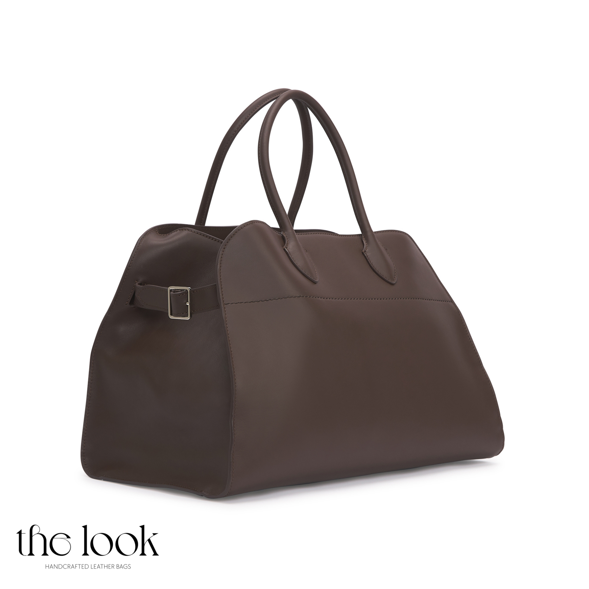 Brown leather handbag on a white background with 'the look' branding. | The Look Officiel