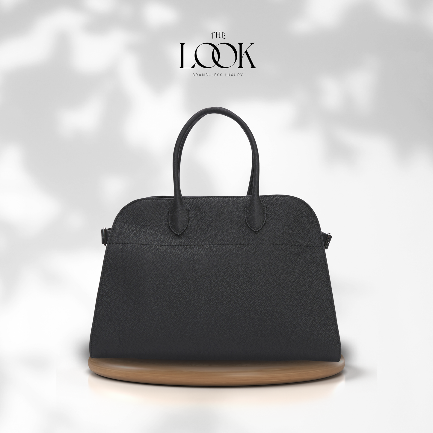 Black handbag with wooden base on a white background, featuring 'The Look' brand. | The Look Officiel