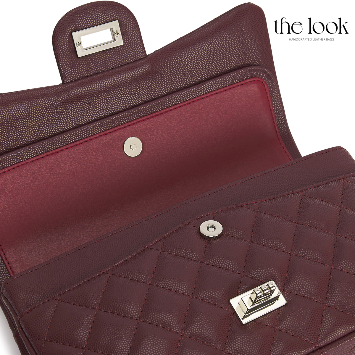 The Quilte Medium Convertible Shoulder Bag in burgundy caviar calfskin leather with silver hardware, double-flap interior close-up view | The Look Officiel
