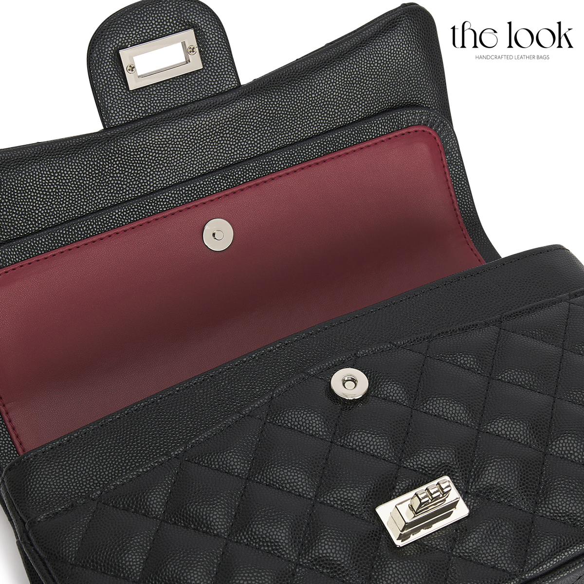 The Quilte Medium Convertible Shoulder Bag in black caviar calfskin leather with silver hardware, double-flap interior close-up view | The Look Officiel