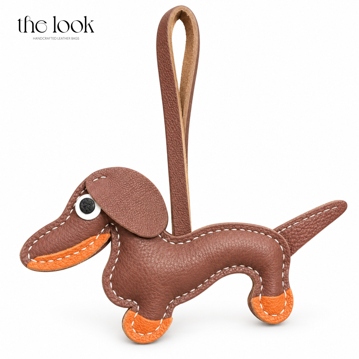 Quirky the Brown Dachshund brown dog bag charm with orange details | The Look Officiel