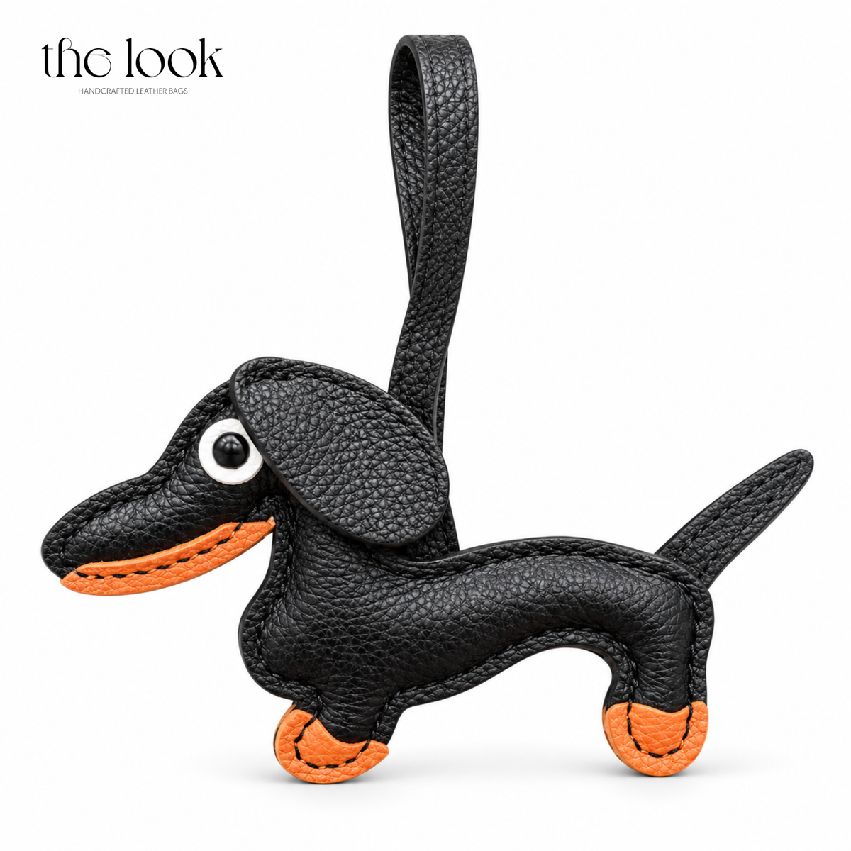 Smokey the Black Dachshund black dog bag charm with orange details | The Look Officiel