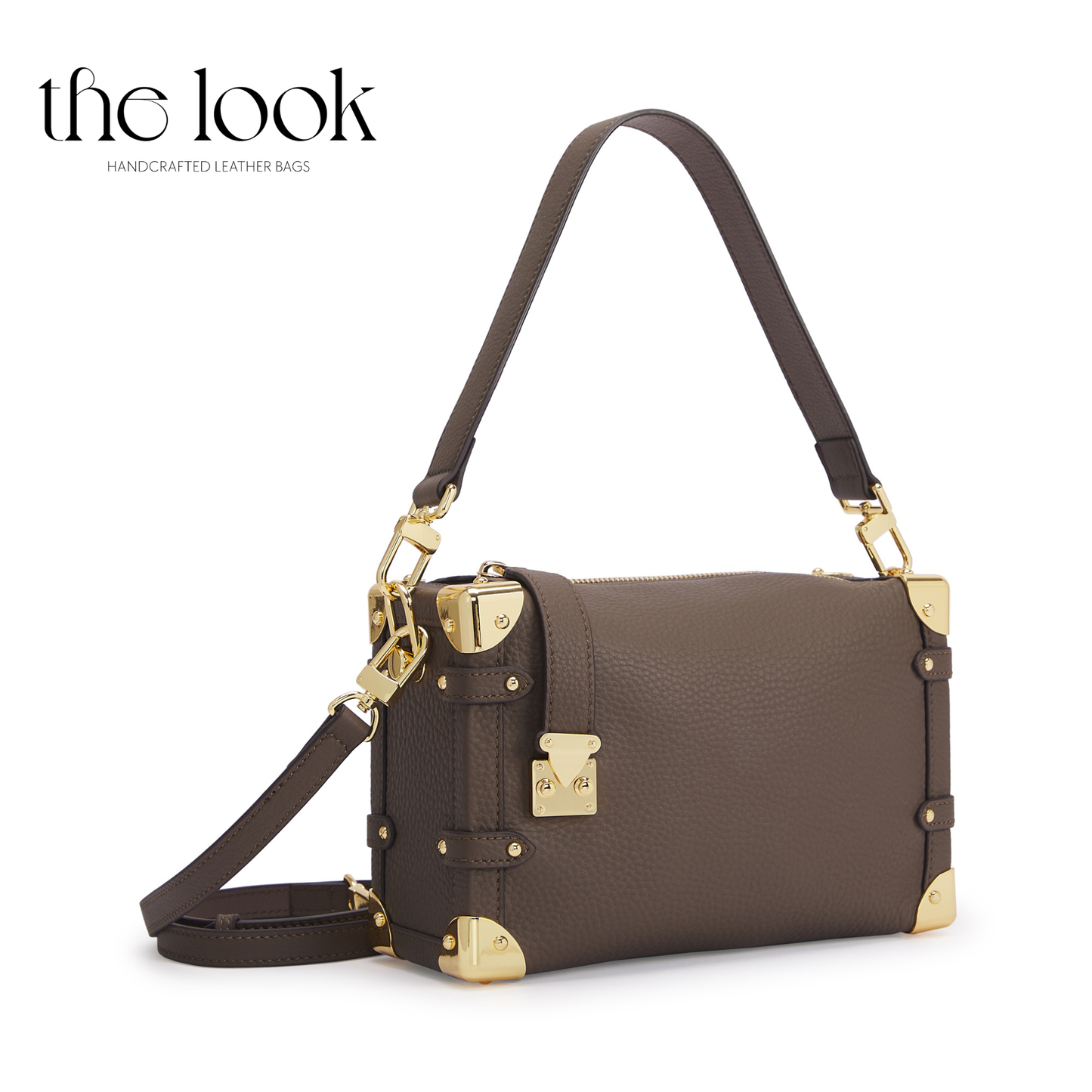 Brown leather handbag with gold accents on a white background, featuring 'the look' brand. | The Look Officiel