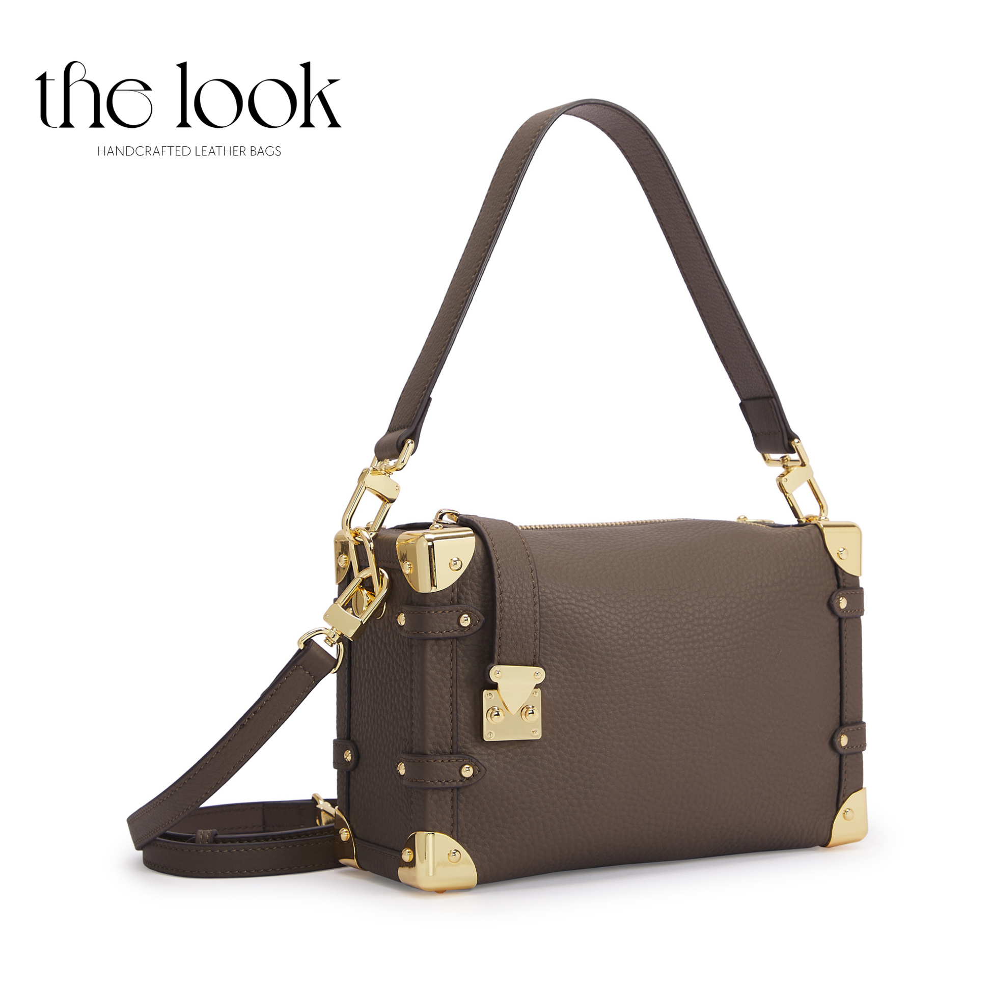 Brown leather handbag with gold accents on a white background, featuring 'the look' brand. | The Look Officiel