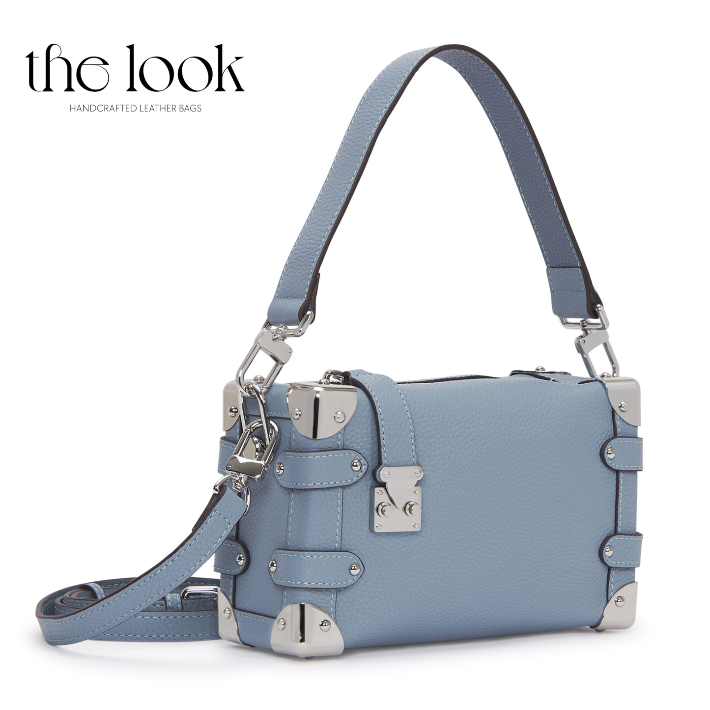 Blue handbag with silver accents on a white background, branded 'the look'. | The Look Officiel