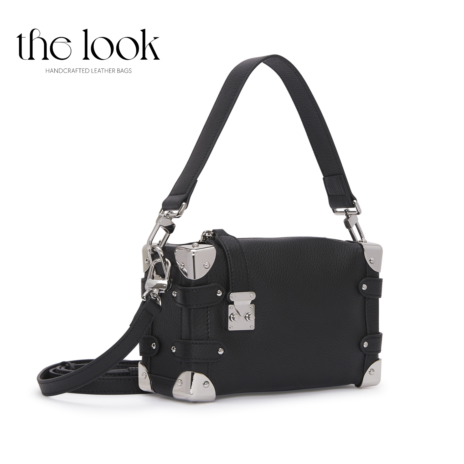 Black leather handbag with silver accents on a white background, branded 'the look'. | The Look Officiel