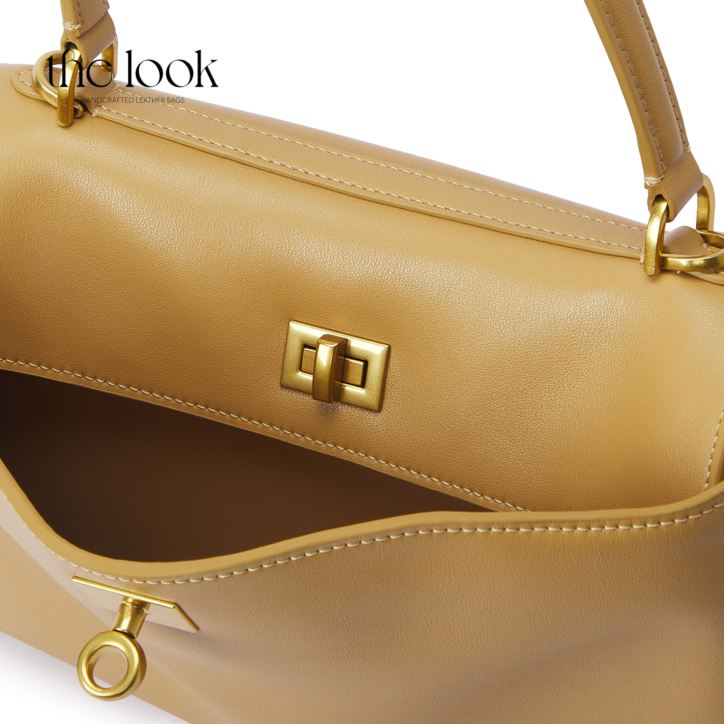 The Valen Medium Satchel — genuine leather handbag, side view | The Look Officiel