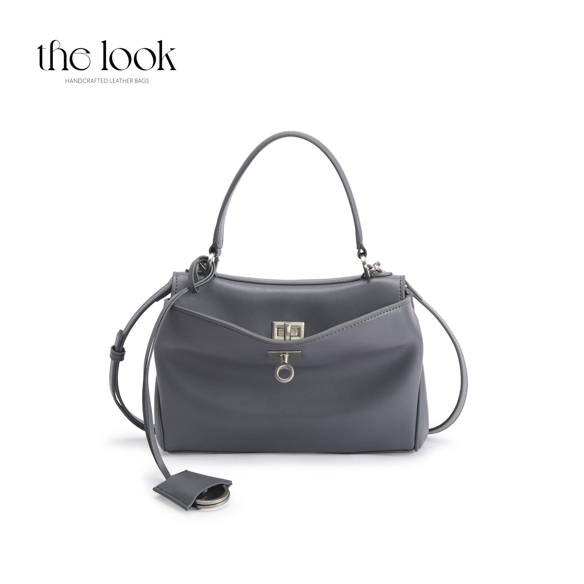 The Valen Small Satchel — genuine leather handbag, alternate colour held | The Look Officiel