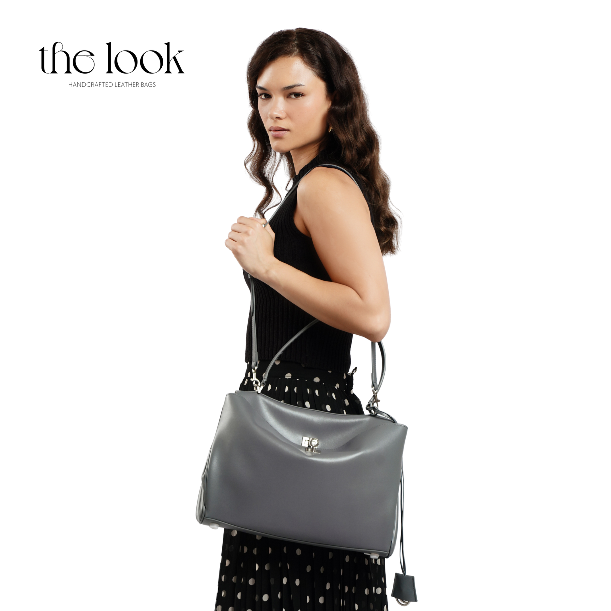 The Valen Large Satchel — genuine leather handbag, third colour held | The Look Officiel