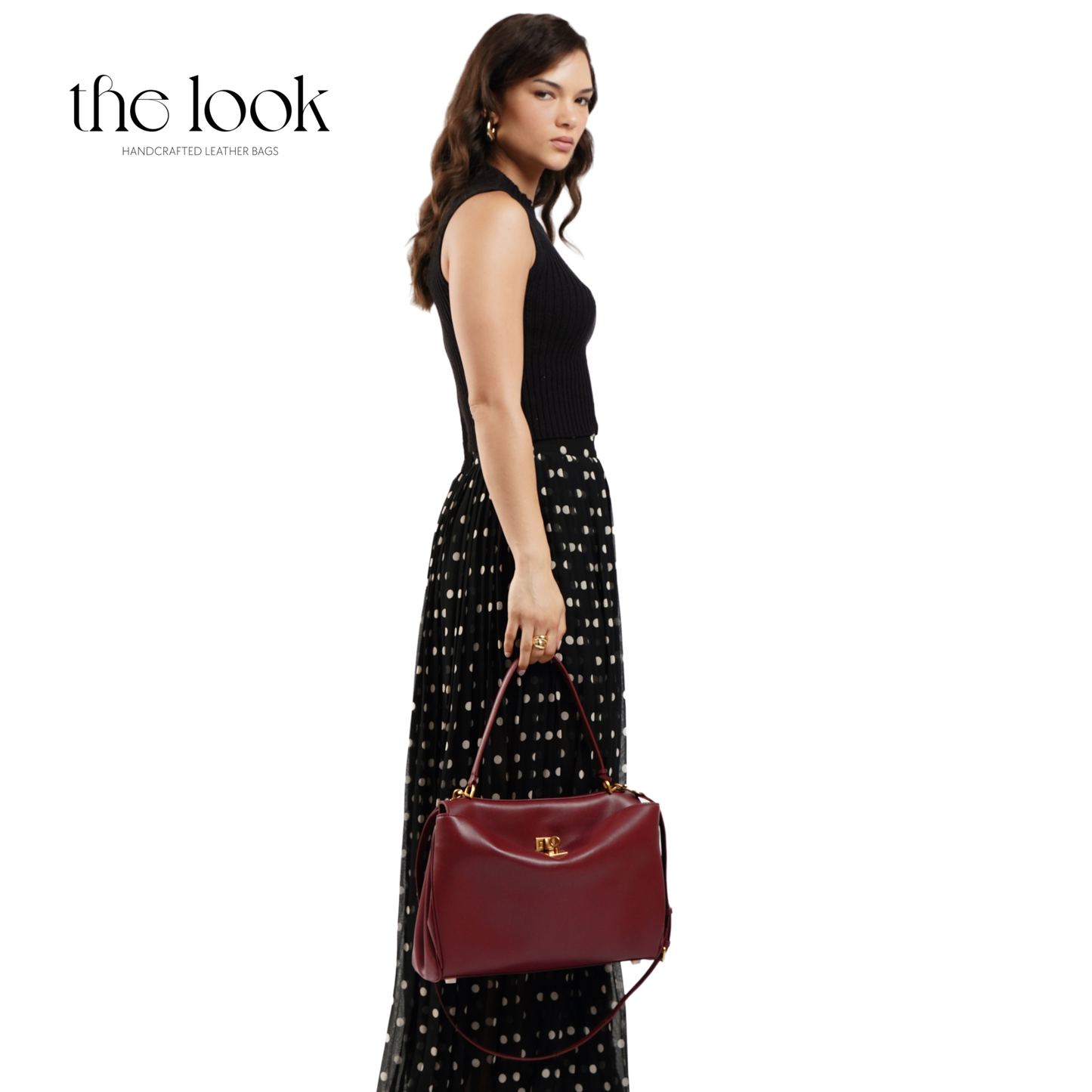 The Valen Large Satchel — genuine leather handbag, alternate colour held | The Look Officiel