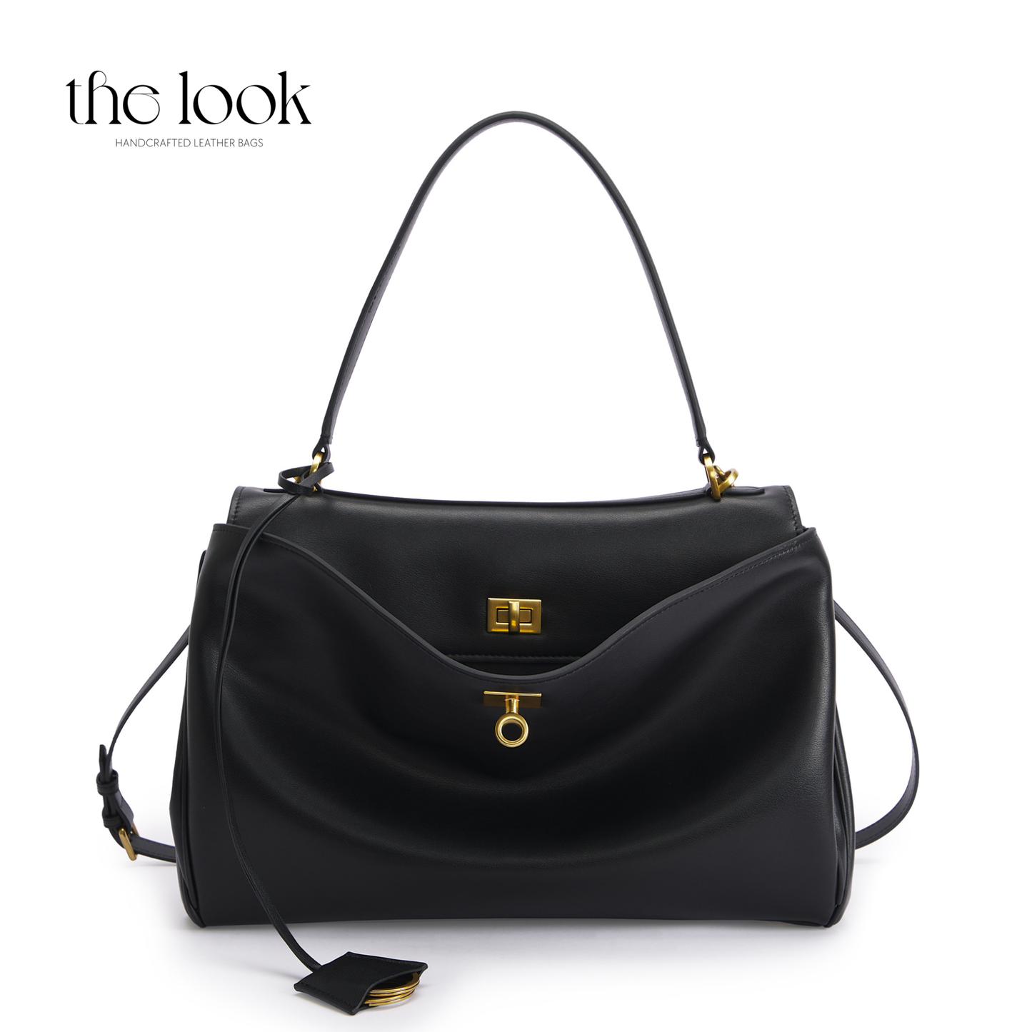 Black handbag with gold accents on a white background, featuring 'the look' branding.