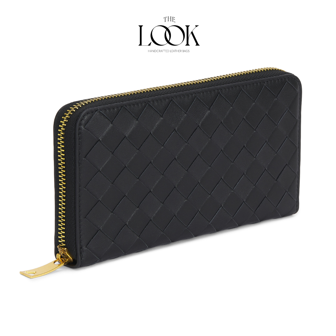 Black lambskin zip-around long wallet with woven pattern and gold-tone hardware angled view