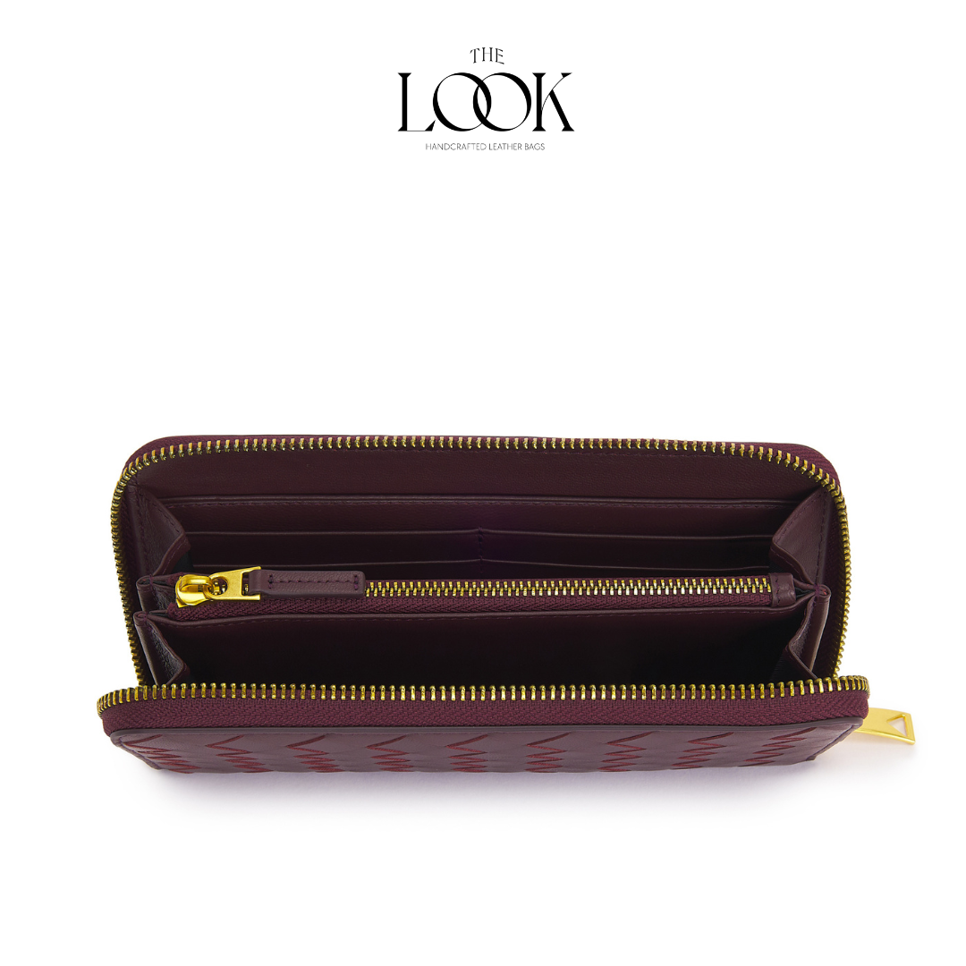 Burgundy lambskin zip-around long wallet with woven pattern and gold-tone hardware internal view